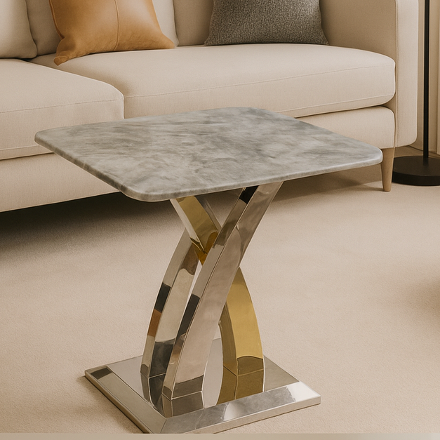Modern coffee table with marble top and gold legs in a living room setting.