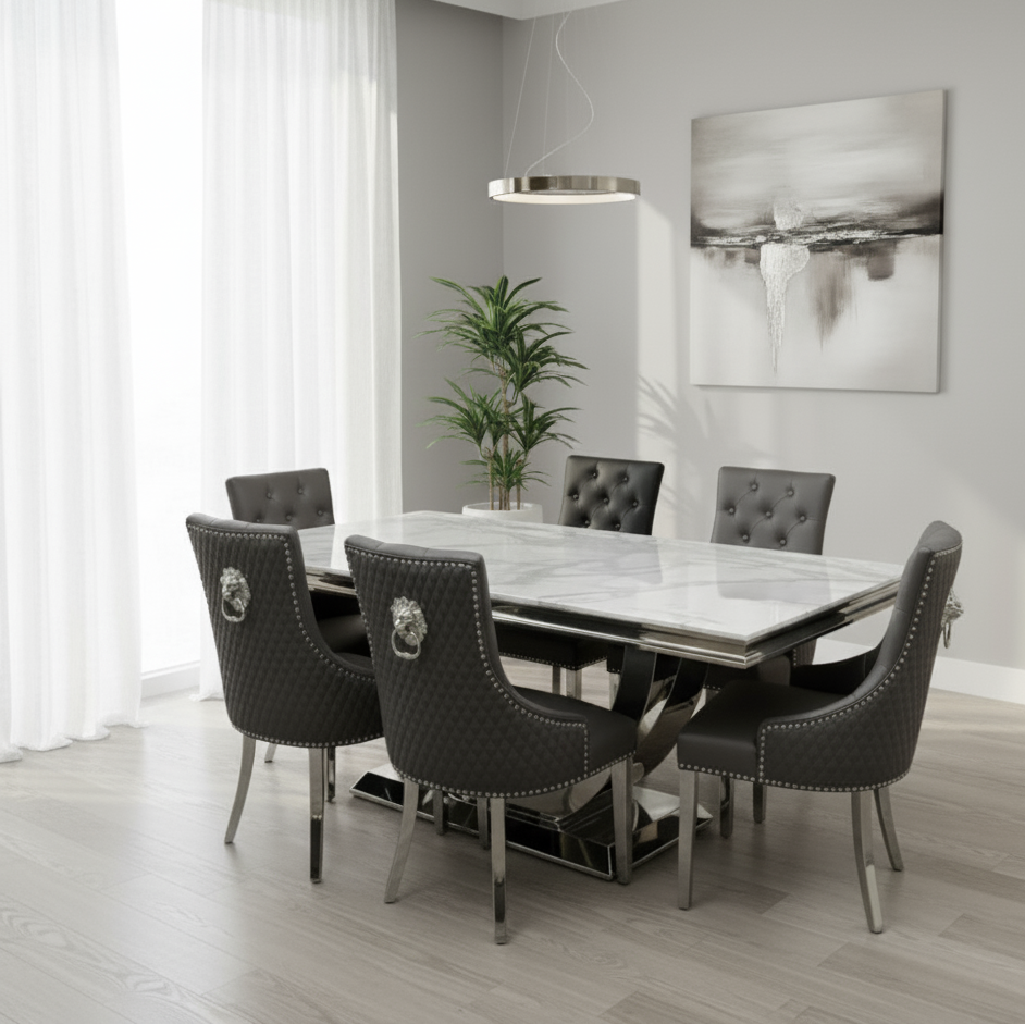 Modern dining room with marble table and gray chairs in a bright room.