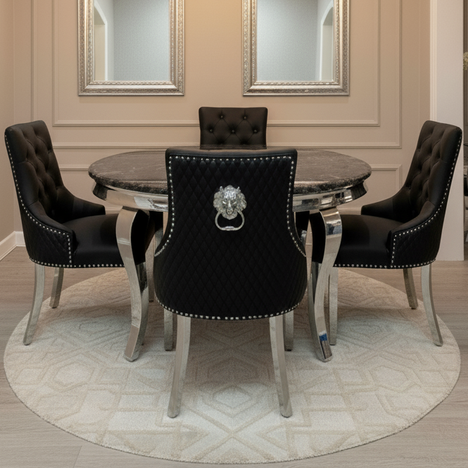 Dining room with round table and black chairs, chandelier, and mirrors on the wall.