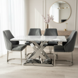 Modern dining room with marble table and gray chairs