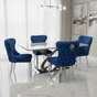 Dining room with a glass table and blue chairs in a modern interior setting.