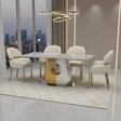 Modern dining room with a marble table and chairs in a stylish interior.